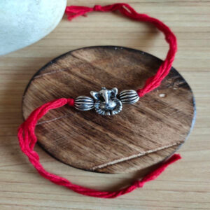 Rakhi- Exclusive Collection in Silver Look alike.